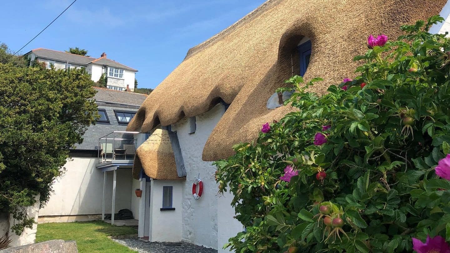 Traditional thatched cottage roof completed by South West Thatching