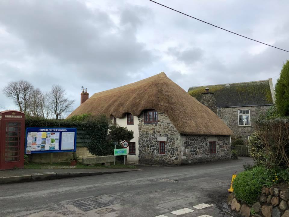 Traditional cottage with freshly completed thatched roof